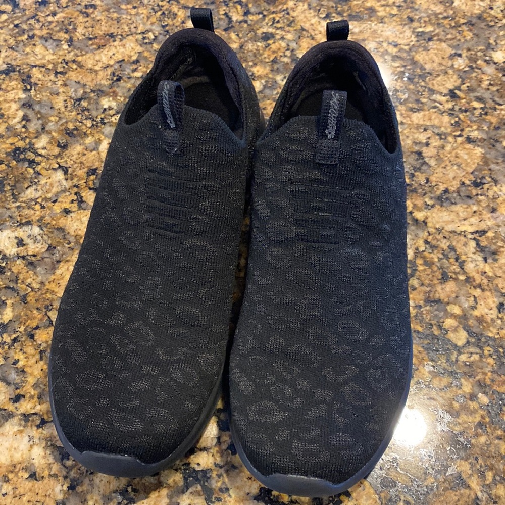 Black leopard slip ultra flex sneakers
